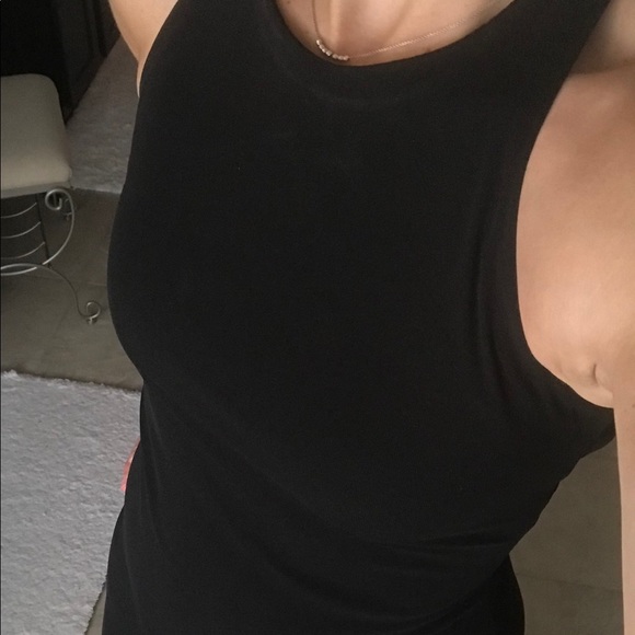 Floor-length black, open-back dress. - Picture 3 of 5